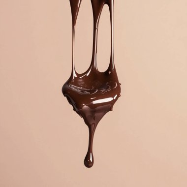 Rich Chocolate Drizzle Mid-Air - Luxurious Dessert Photography clipart