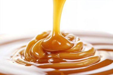 Close-Up of Pouring Caramel - Rich and Glossy Liquid Texture clipart