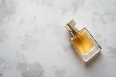 Minimalist Perfume Bottle on Light Concrete Background - Elegant Fragrance Design clipart