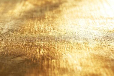 Minimalist Gold Surface with Subtle Light Reflections - Luxurious Metallic Texture clipart