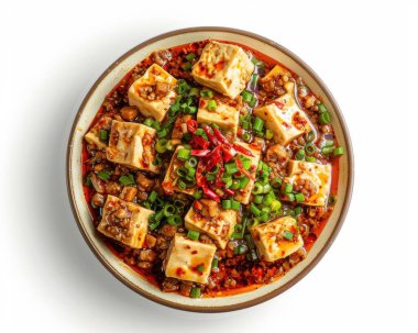 A vibrant bowl of spicy Mapo Tofu, featuring tender tofu cubes in rich sauce topped with fresh green onions. clipart