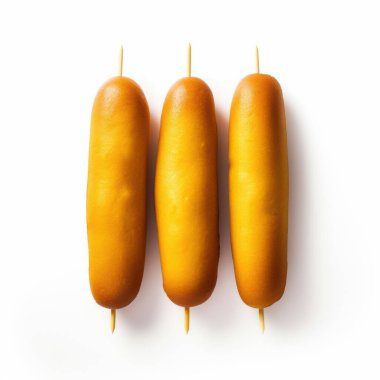 Three golden corn dogs lined up on a white background, showcasing their crispy texture. clipart