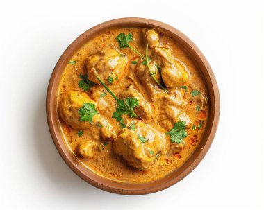 Aromatic chicken curry served in a clay bowl, garnished with fresh cilantro. clipart