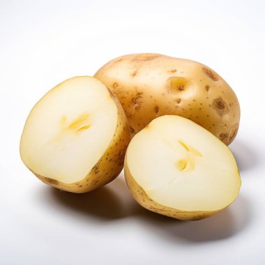 Fresh, whole and halved potatoes showcasing their natural, earthy texture and creamy flesh. clipart