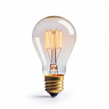 A glowing vintage light bulb against a white background, showcasing its warm filament and classic design. clipart