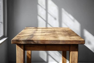 empty wooden table with a window