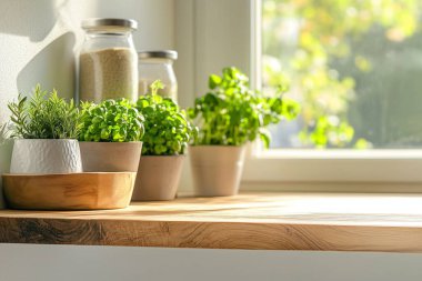 fresh herbs and vegetables on kitchen table