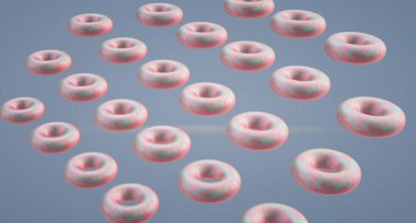 Colorful pink and blue donuts floating in a dreamy background.