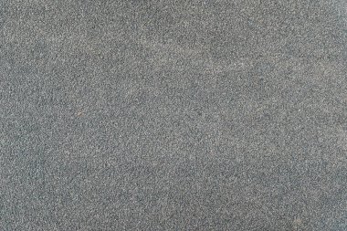 Close-up of textured gray carpet with subtle variations and patterns. clipart