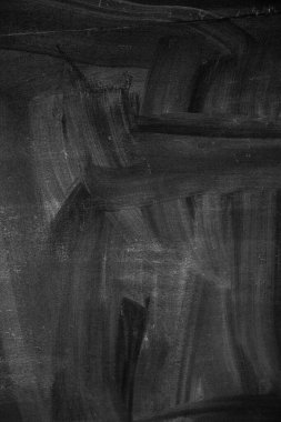 Abstract black and gray brush strokes on canvas. clipart