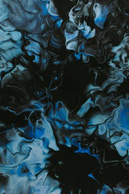 Abstract blue and black fluid art with swirling patterns and rich textures. clipart