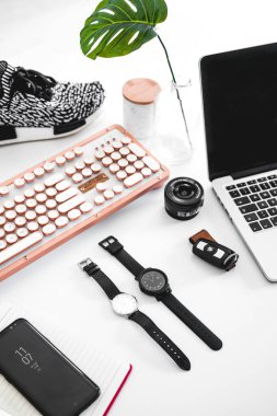 Stylish workspace with modern gadgets and accessories. clipart