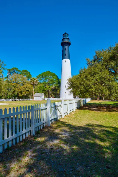 stock image Hunting Island, South Carolina United States - March 5, 2023: The Hunting Island Light is located on Hunting Island near Beaufort, South Carolina. The lighthouse is currently closed to the public.