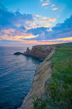 St. Lawrence Körfezi üzerinde gün batımı Cape St. George Newfoundland 'da.