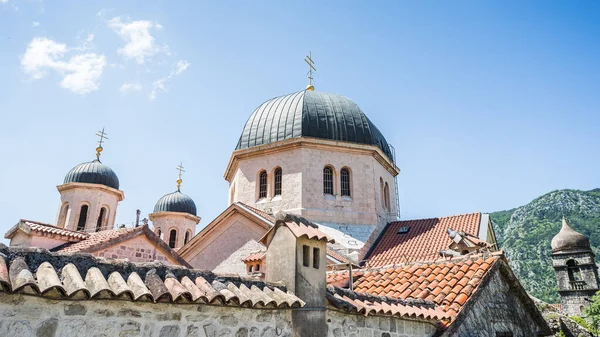 stock image The roof tops and domes on the Church of St Nicholas in the heart of Kotor old town seen in May 2023.