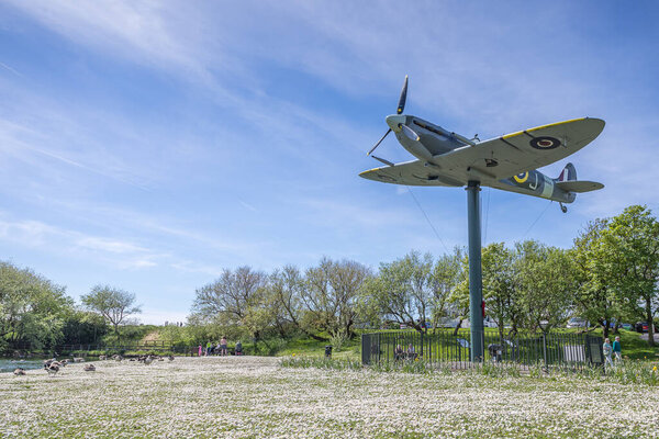 A replica Spitfire fighter aircraft from WW2 pictured on the edge of Fairhaven Lake in Lytham, Lancashire on 5 May 2024.