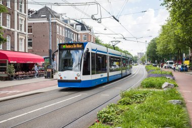 Amsterdam 'da bir numaralı tramvay 238 Mayıs 2024' te Hollanda 'da Osdorp De Aker' e doğru ilerliyor..