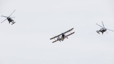 Taranto formation above Southport comrpising Westland Wasp, Royal Navy Swordfish and a pair of Wildcat HMA2 helicopters pictured on 13 July 2024 in Merseyside, England. clipart