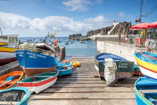 stock image Colourful fishing boats on the slipway at Camara de Lobos, a fishing village on the South coast of Madeira seen on 8 August 2024.