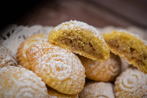 stock image Traditional eid maamoul or mamoul cookies with dates, nuts, and jam, Arabic sweets for Aid al-Fitr and easter, High quality photo