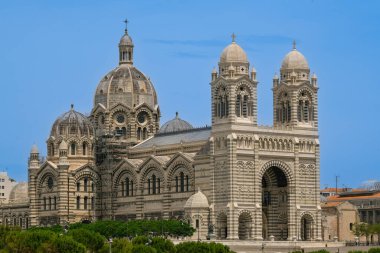 Majestically overlooking the bustling Port of Marseille, the Marseille Major Cathedral stands as a testament to the citys rich history and architectural grandeur, High quality photo clipart