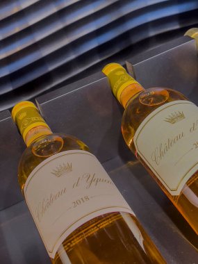 France Bordeaux 01.20.2025, Two bottles of 2018 Sauternes wine are elegantly presented, highlighting the rich color and luxurious design that signifies a high-quality vintage selection. clipart