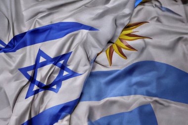 İsrail bayrağı bulutlu mavi gökyüzüne doğru dalgalanıyor. İsrail 'in ulusal kimliği, mirası ve gururunun sembolü