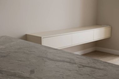TV stands in a modern interior of a new apartment