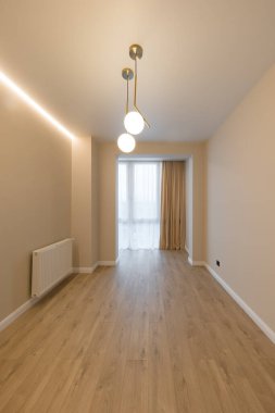 White room in the apartment. Modern interior in a new building