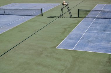 Top view of the tennis court on the territory of the recreation complex.