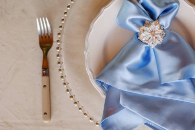 Birthday table decor. Blue glasses and napkins.