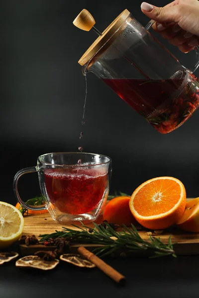 Fruit Tea Poured Transparent Glass Next Fruits Black Background — стоковое фото