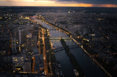 High Resolution Panorama Of Paris Skyline from Eiffel Tower during rainy sunset.
