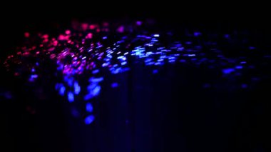 4K Soyut dijital parçacık dalgası ve ışık soyut arkaplan, animasyon siber veya teknoloji arka planı. Havai fişek festivali. Siyah arka planda izole edilmiş. Parlayan Parçacıklar.