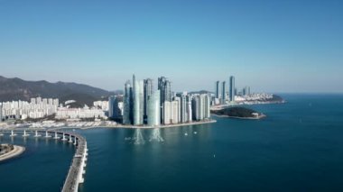Deniz Kenti Haeundae şehir merkezi gökdelenler Busan, Güney Kore yüksek kaliteli 4K görüntü