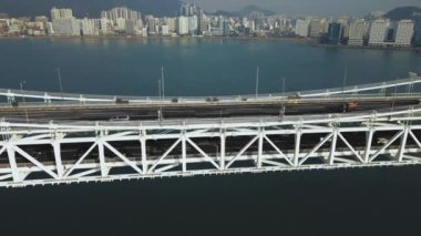 Güney Kore Busan 'daki Gwangan Köprüsü ve Haeundae' nin hava görüntüsü. Yüksek kalite 4k görüntü