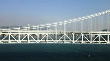 Güney Kore Busan 'daki Gwangan Köprüsü ve Haeundae' nin hava görüntüsü. Yüksek kalite 4k görüntü