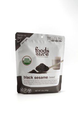 Fuji City, Shizuoka Prefecture, Japan - April 11, 2024: Organic Black Sesame Seed 340 g supplement by Foods Alive. Isolated on white background. clipart