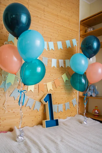 balloons, paper garlands and wooden number 1, photo zone for 1 year old child