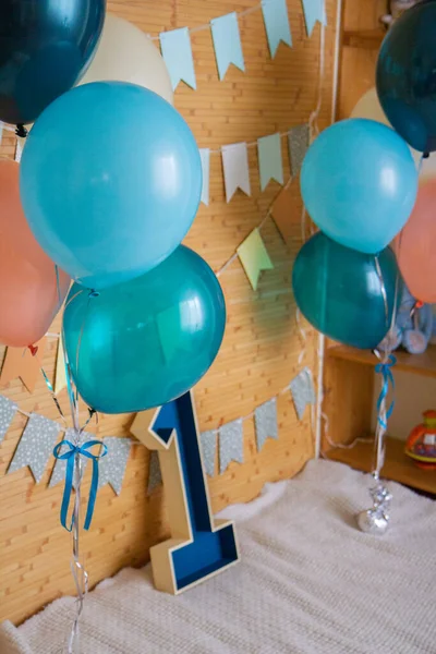 balloons, paper garlands and wooden number 1, photo zone for 1 year old child