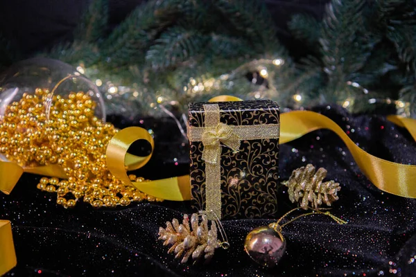 christmas tree and gift and golden decorations