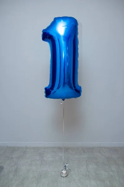 Blauwe Ballon Folie Nummer Een Muur Achtergrond — Stockfoto