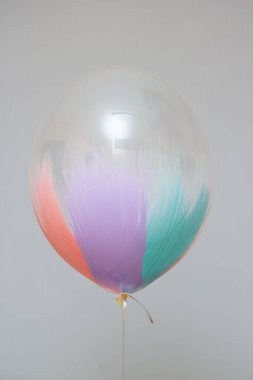 colorful balloon brush on wall background