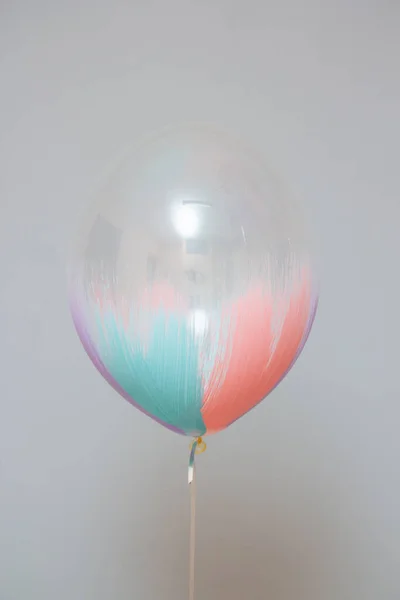 colorful balloon brush on wall background