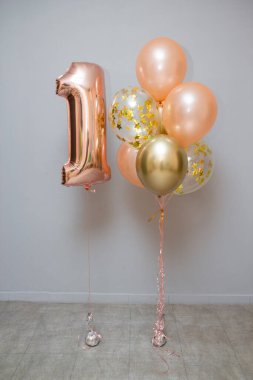 figure one balloon and a set of pink balloons. birthday card