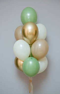 card with balloons for the holiday, balloons with helium on a gray background