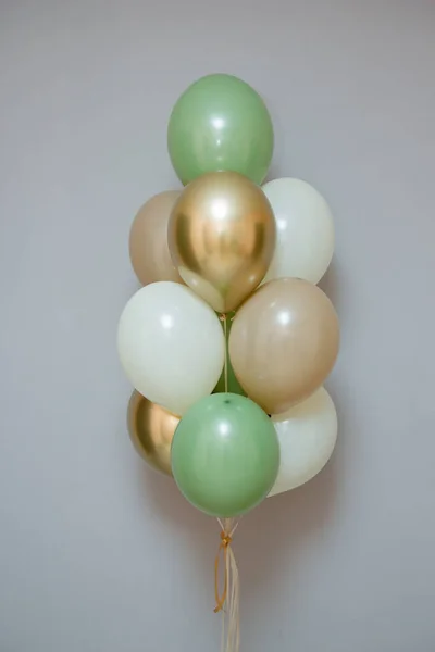 card with balloons for the holiday, balloons with helium on a gray background