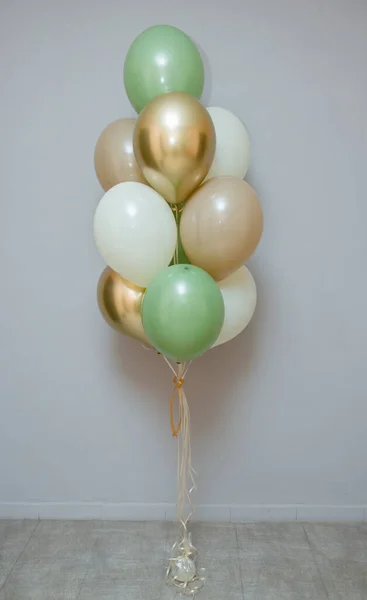 card with balloons for the holiday, balloons with helium on a gray background