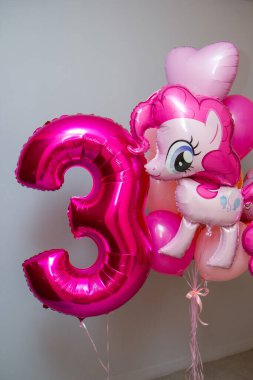 pink pony balloon, crimson and pink balloons for the holiday