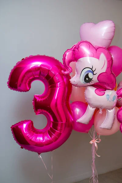 pink pony balloon, crimson and pink balloons for the holiday